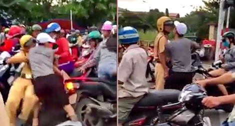 Người dân hỗ trợ CSGT khống chế kẻ chống người thi hành công vụ